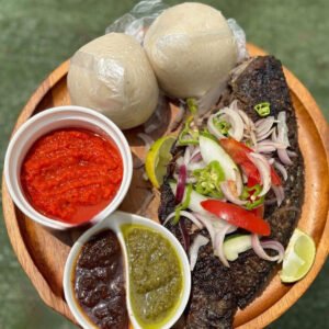 Banku with grilled talipa fish and shito