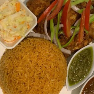 jollof rice with turkey meat and salad