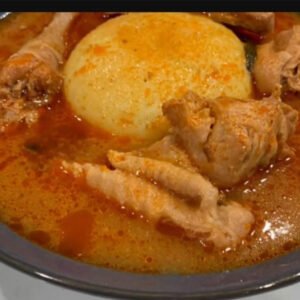 Fufu with chicken light soup or Goat meat soup